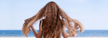 woman's wavy hair on the beach