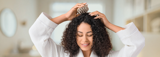 Curly haired woman looking concerned